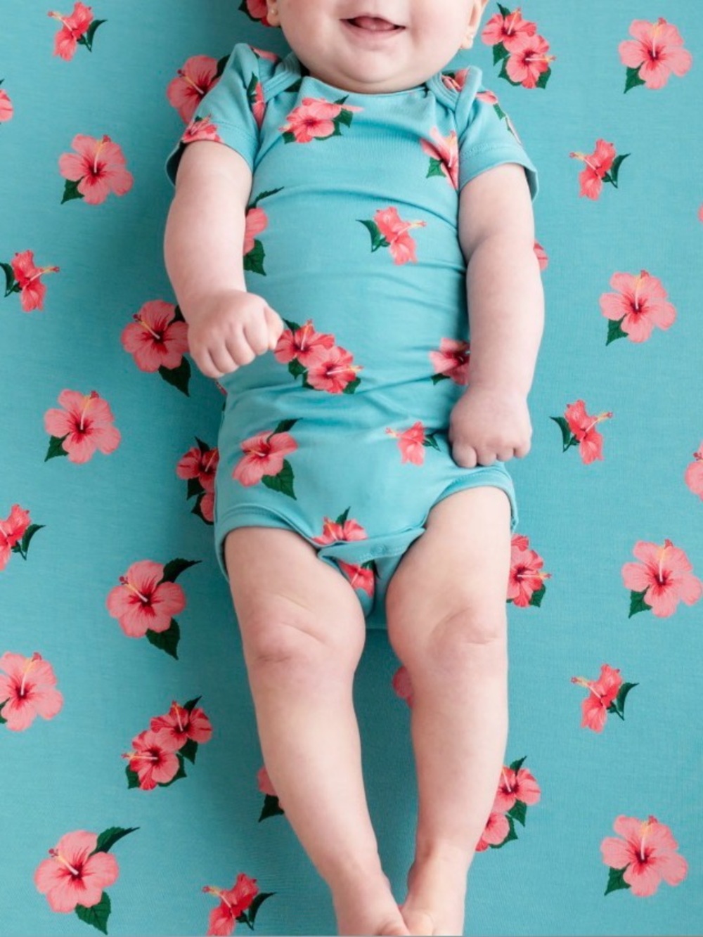Kyte Baby Bodysuit in Hibiscus 18-24 month